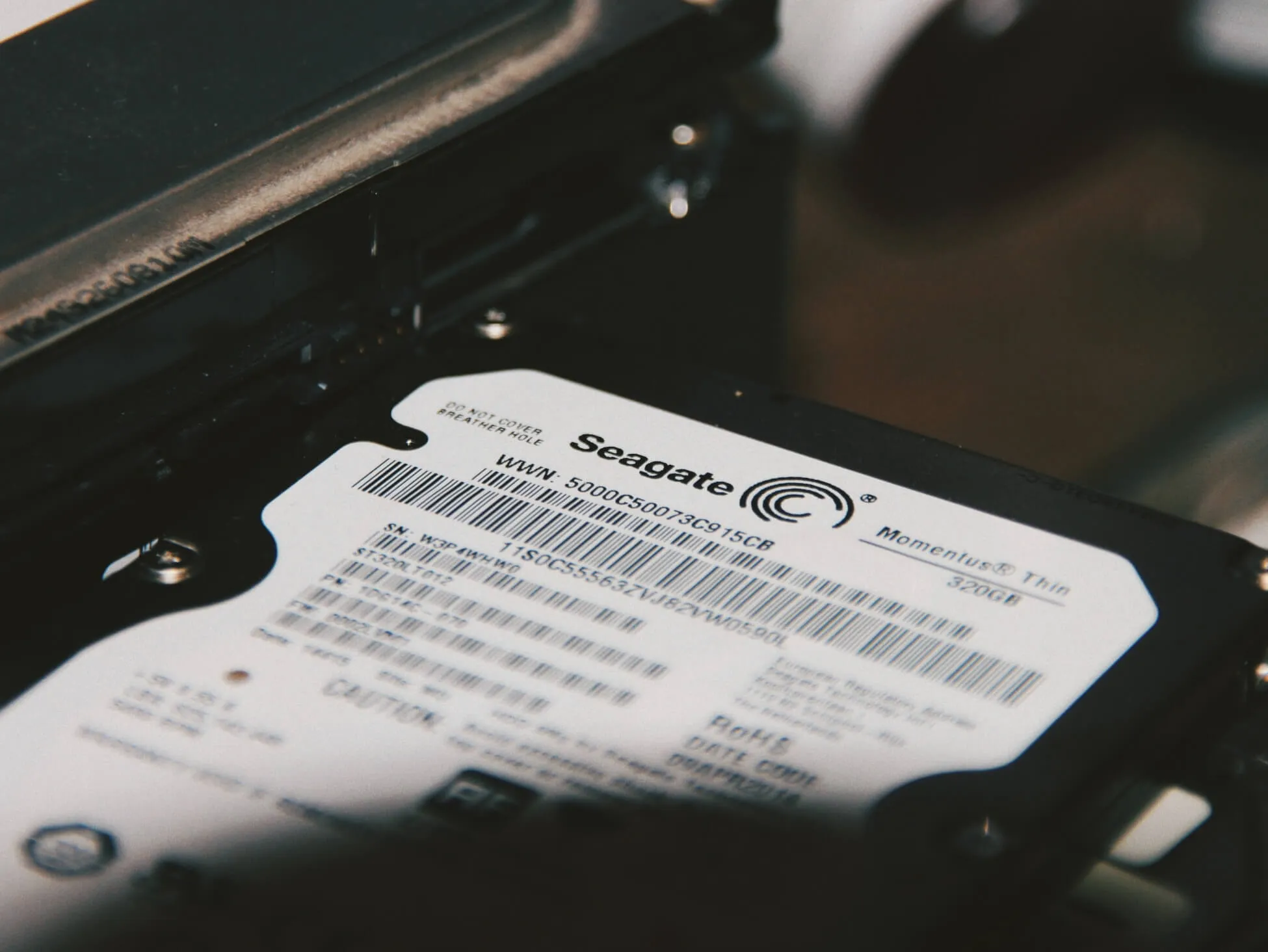 Technicians processing end-of-life IT equipment